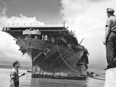 Hornet moored at Ford Island, Pearl Harbor, following deployment with Task Force 17 to the Battle of the Coral Sea. Note the hull paint condition following two campaigns. May 27th, 1942.