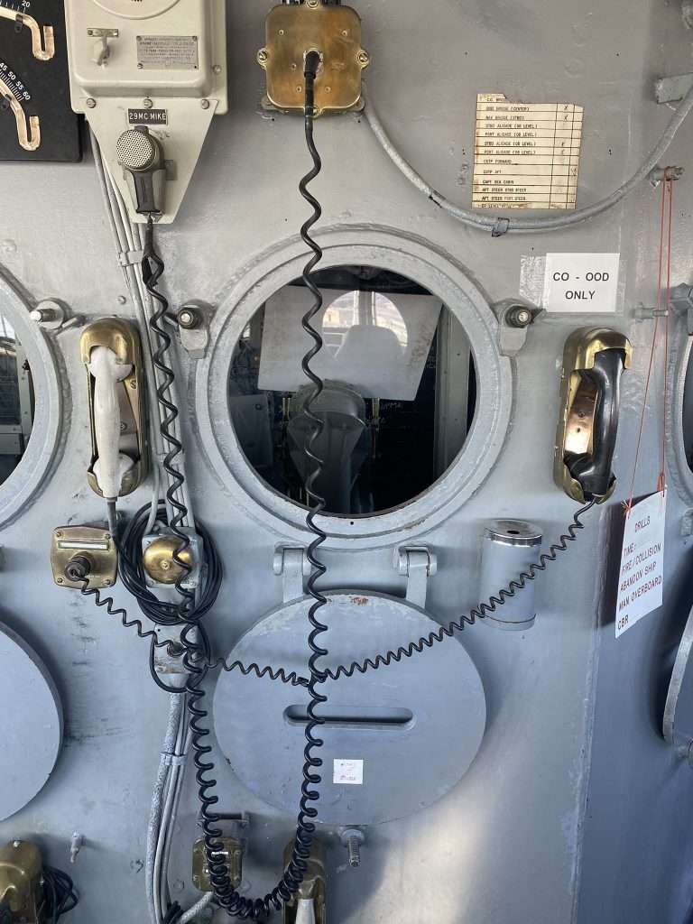 Portholes and telephone on ship