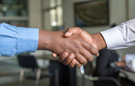 Two people shaking hands