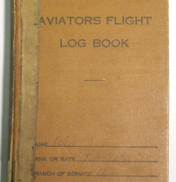 Aviator's flight log book with brown cover.