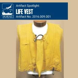 Yellow life vest, Artifact No. 2016.009.001.