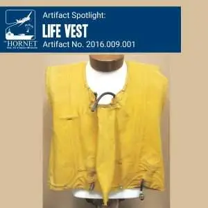 Yellow life vest, Artifact No. 2016.009.001.