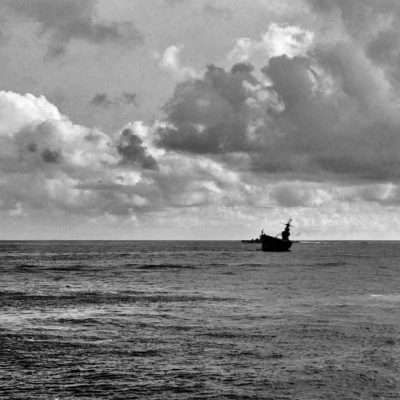 USS Hornet (CV-8) dead in the water and abandoned in the aftermath of second Japanese attack of the day during the Battle of Santa Cruz Islands.