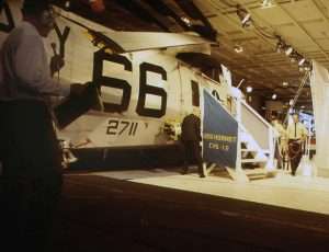 Apollo recovery helicopter, Navy 66, parked in the USS Hornet hangar.